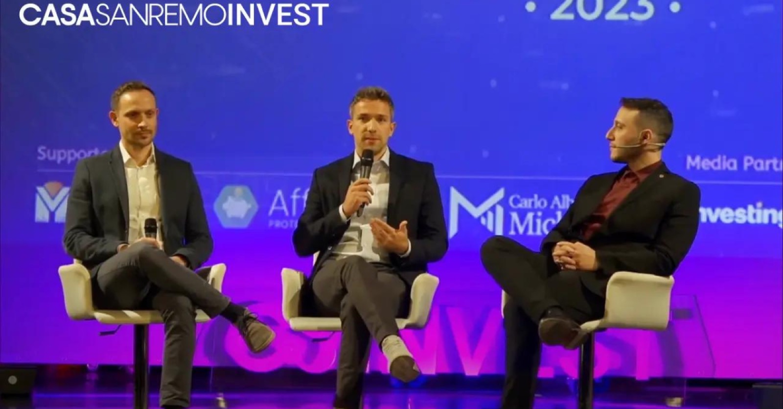 Fabio Faccin on stage during a panel at Casa Sanremo Invest 2023